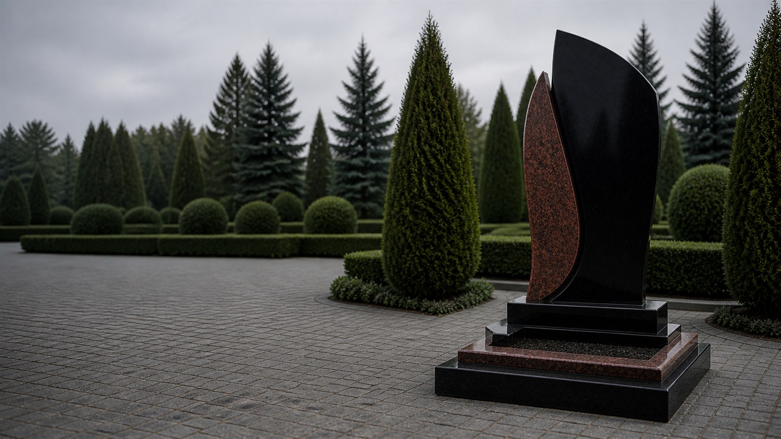 Комбинированный памятник из чёрного и красного гранита